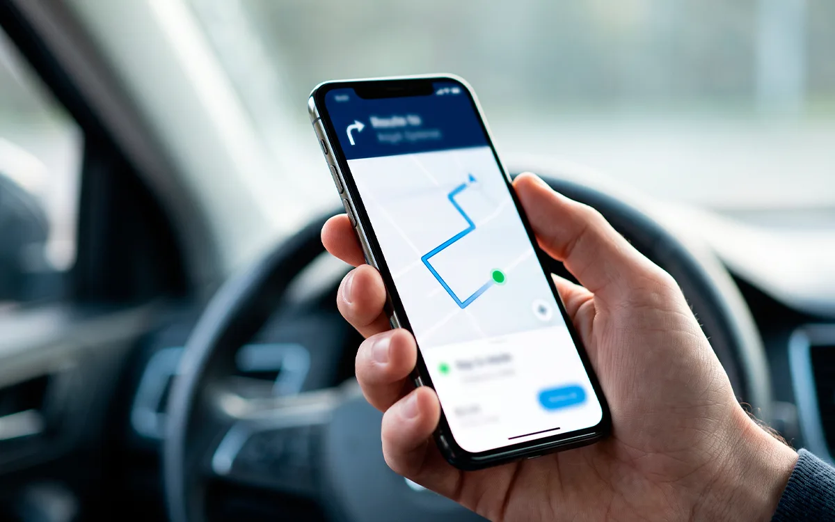 Driver checking the On Time app before a route